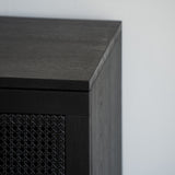 Černá dubová komoda s ratanem Donau.