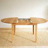 Rozkládací dubový jídelní stůl Kunst.